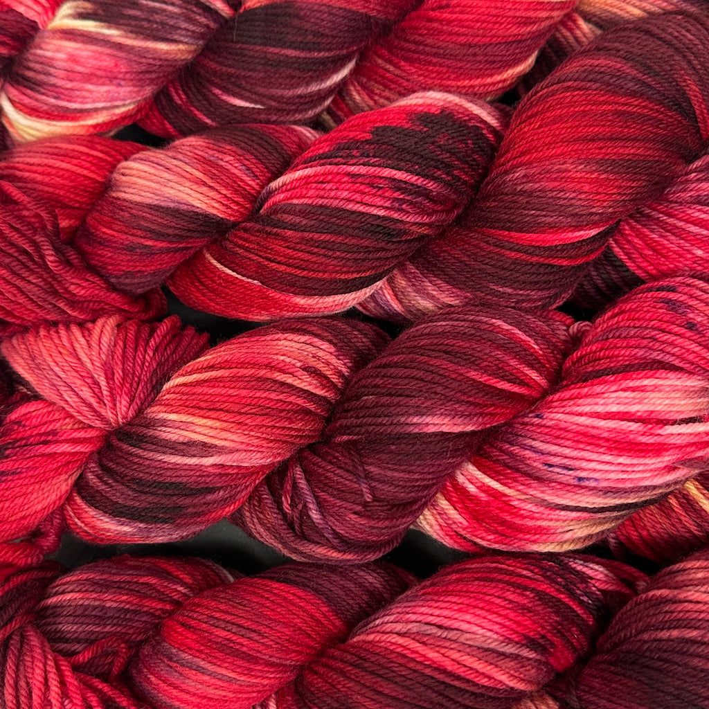 Still heavy DK to light worsted Ruby Red